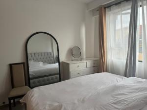 En eller flere senge i et værelse på Greenes property