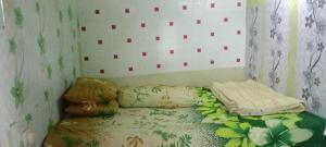 Ліжко або ліжка в номері Javalindra Homestay Tour and Travel