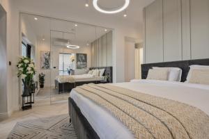 Giường trong phòng chung tại City view - Luxury Apartment A - Old City - Victoriei