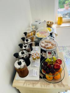 a table with many different types of food on it at B&B L'Agapanto in Capri