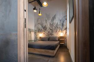 a small bedroom with a bed in a hallway at Vatican Boutique Apartment with large Terrace in Rome