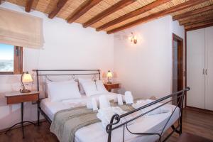 Ένα ή περισσότερα κρεβάτια σε δωμάτιο στο Villa d'amour +190 φωτογραφίες