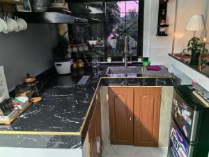 Dapur atau dapur kecil di Tiny House Loft Style