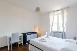 Posteľ alebo postele v izbe v ubytovaní JOIVY Spacious Family Apt for 4, in Carignano, Genoa