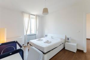 Posteľ alebo postele v izbe v ubytovaní JOIVY Spacious Family Apt for 4, in Carignano, Genoa