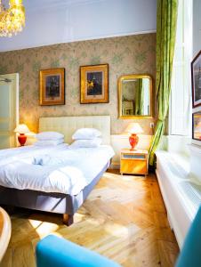 Postel nebo postele na pokoji v ubytování Boutique Hotel Museumkwartier