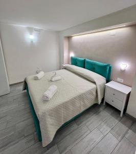 Postel nebo postele na pokoji v ubytování Costa degli Dei Rooms