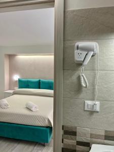 Postel nebo postele na pokoji v ubytování Costa degli Dei Rooms