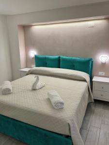 Postel nebo postele na pokoji v ubytování Costa degli Dei Rooms