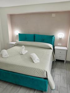 Postel nebo postele na pokoji v ubytování Costa degli Dei Rooms