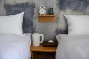 Postel nebo postele na pokoji v ubytování HOTEL WAN OSAKA EBISU