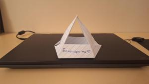 a paper boat on top of a laptop computer at Casa Ferrari Bed & Breakfast in Sofia