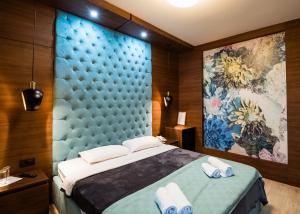 Postel nebo postele na pokoji v ubytování Hotel Zeleni Vir