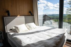 The Riverside Mountain Lodge - 110sqm clam luxury - including bed linens, towels,客房内的一张或多张床位