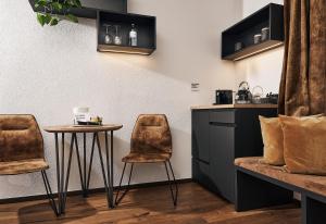 Kuchyňa alebo kuchynka v ubytovaní Lieperts CAFÈ DINNER ROOMS