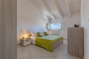 Postel nebo postele na pokoji v ubytování La Piccola Venezia Apartment