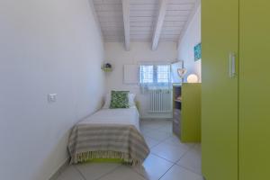 Voodi või voodid majutusasutuse La Piccola Venezia Apartment toas