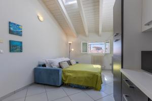 TV a/nebo společenská místnost v ubytování La Piccola Venezia Apartment