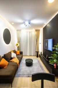 Posezení v ubytování Andrena Smart Haven Lakeside Condo in Entebbe