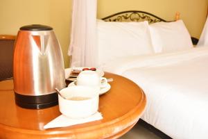 Wagon Wheel Hotel Eldoret客房内的一张或多张床位