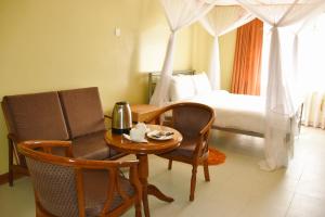 Wagon Wheel Hotel Eldoret客房内的一张或多张床位