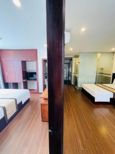 Rúm í herbergi á Danang Classic Hotel