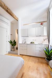 Køkken eller tekøkken på Cantoni 4B - Studio at Colosseum