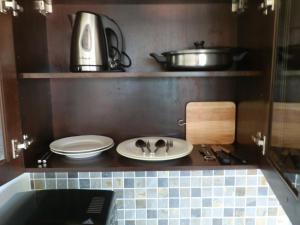 Кухня или кухненски бокс в Ocean View Mini-Villa