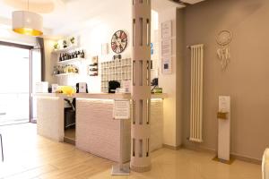 Kuchyň nebo kuchyňský kout v ubytování Golden Milano Hotel