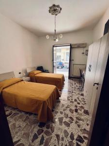 Ένα ή περισσότερα κρεβάτια σε δωμάτιο στο De Giovanni's House +5 φωτογραφίες