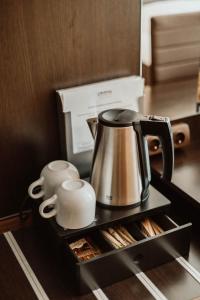 Příslušenství pro přípravu čaje a kávy v ubytování Hotel Liburnia