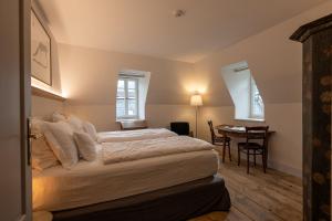 Posteľ alebo postele v izbe v ubytovaní Steinach Townhouse Meran