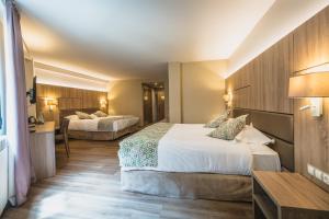 Hotel Princesa Parc客房内的一张或多张床位
