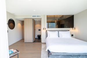 Letto o letti in una camera di Exclusive Boutique Hotel Elisabetta