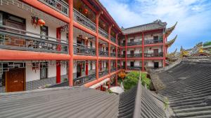 a large building with stairs in front of it at Wenjun Courtyard Hotel ---5 mins walk from Tonghuimen metro station, near Tianfu square, close by culture park and Sichuan opera house, English speaking service, local tours in Chengdu
