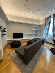 TV i/ili multimedijalni sistem u objektu Casa nel Vicolo - Duomo di Osimo e 20 min da Loreto
