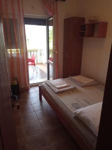 Voodi või voodid majutusasutuse Apartment Željka, Igalo - Herceg Novi toas