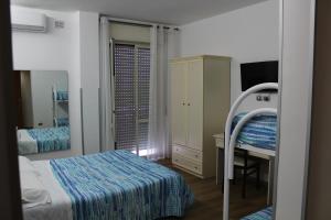 A bed or beds in a room at Otto&Mezzo B&B Még 21 kép