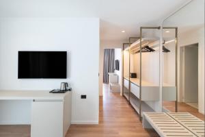 TV a/nebo společenská místnost v ubytování Morina Beach Hotel