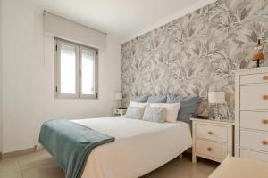 Posteľ alebo postele v izbe v ubytovaní Apartamento Vera Canteras