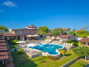 an aerial view of a house with a swimming pool at Hotel Anchor in Sinemorets