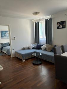 Postel nebo postele na pokoji v ubytování Apartman Bura + 7 fotografií