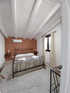 Ένα ή περισσότερα κρεβάτια σε δωμάτιο στο Green House La Torre
