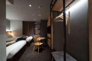 Voodi või voodid majutusasutuse hotel around TAKAYAMA, Ascend Hotel Collection toas