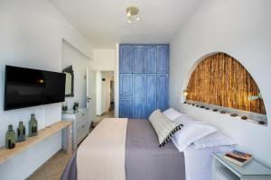 Televisyen dan/atau pusat hiburan di Terra Vecchia Suites