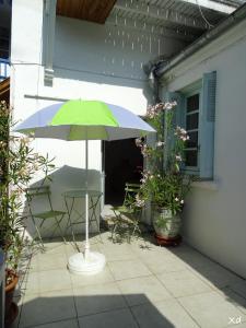 Patio nebo venkovní prostory v ubytování Appartement Confortable