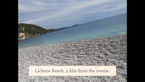a picture of a beach with the words littles beach km from at Εξοχή in Parga