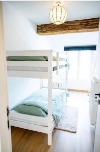Postel nebo postele na pokoji v ubytování Suite26-2