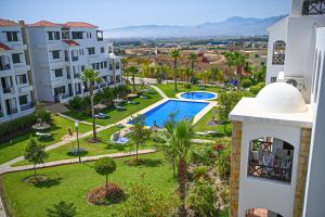 Bazén v ubytování Appartement climatisé vue piscine - Lilacs garden CaboNegro nebo v jeho okolí