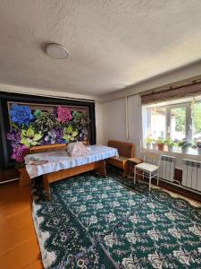 Ένα ή περισσότερα κρεβάτια σε δωμάτιο στο Guesthouse Koguchkon